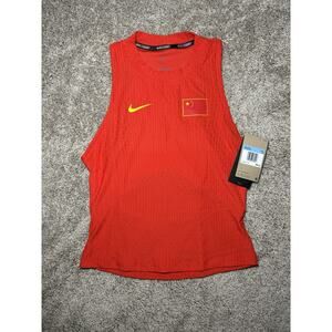 NikeCourt Slam Dri-FIT Tennis Tank Top China Women's Size Medium FD9057-675 NEW